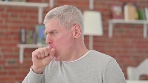 Mature Man Coughing Due to Illness Close Up
