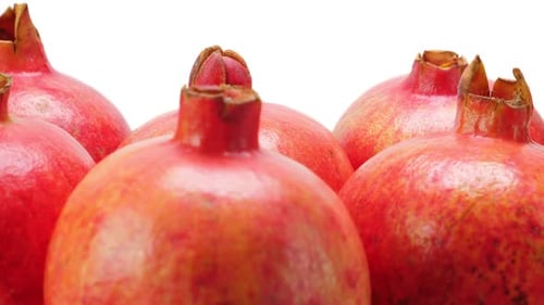 Group of Fresh Pomegranates Close Up