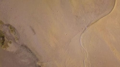 Aerial View of Wavy Desert Landscape