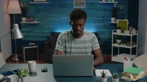 Business Man Doing Remote Corporate Work on Laptop