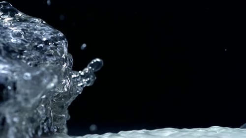 Macro Water Splash Against Black Background