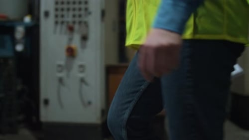 Unrecognizable Industrial Engineer Walking Manufacturing Company Hold Documents