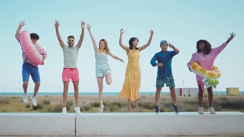 Group of friends having fun on the beach.