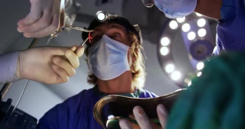 Surgeons performing operation 4k