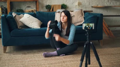 Woman Demonstrating VR Headset for Smartphone Camera