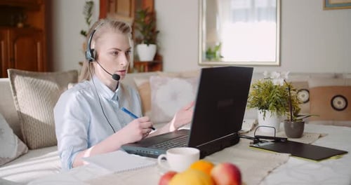 Woman Working Remotely from Home Office