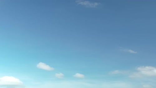 Gentle Clouds Drifting Across a Blue Sky