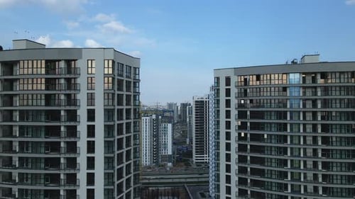 Construction of a modern city block. Multi-storey buildings