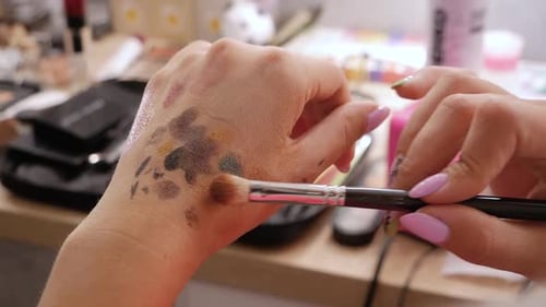 Makeup Artist Hands Mix Shadows
