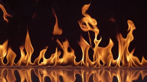 Flames burning on black background in slow motion; shot on Phantom Flex 4K at 1000 fps