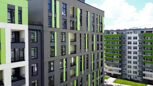 Aerial drone view of a flying over the modern residential building.