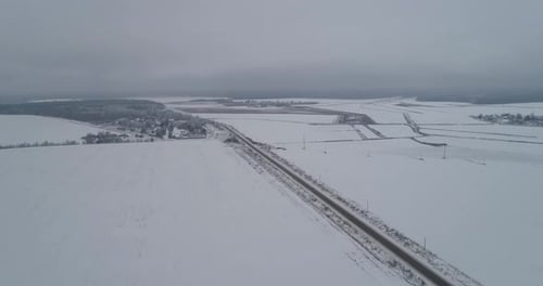 Winter Road in the Field