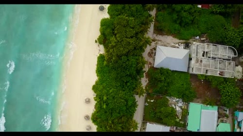 Aerial drone scenery of paradise coast beach break by turquoise water and white sand background of a