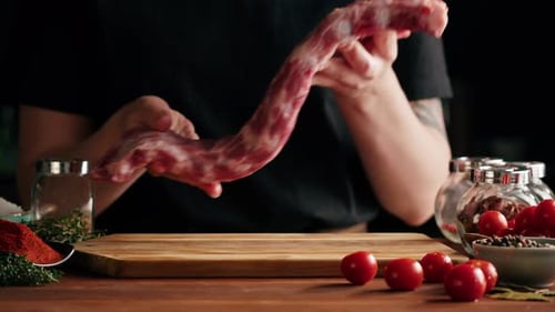 Woman Chef Cooking Ribs Closeup