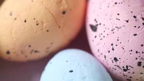 Close Up of Easter Concept with Multi Color Egg on Pink Background