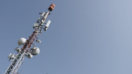 Telecommunication tower antenna panel system background 4K 3840X2160 UHD panning footage - Signal r