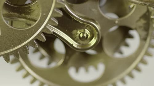 Gold Gears Turning Close Up