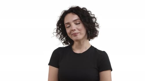 Attractive Woman Smiling in Studio Portrait
