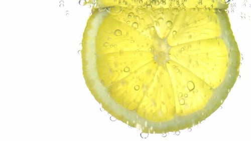 Lemon Slice with Bubbles in Clear Liquid