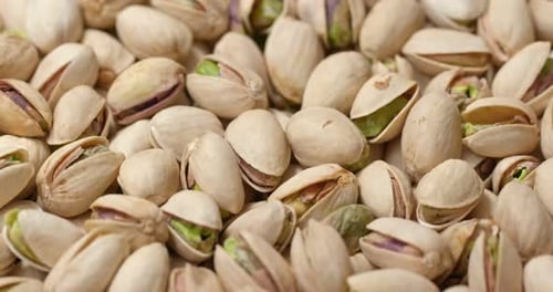 Pile of delicious pistachios in their shells