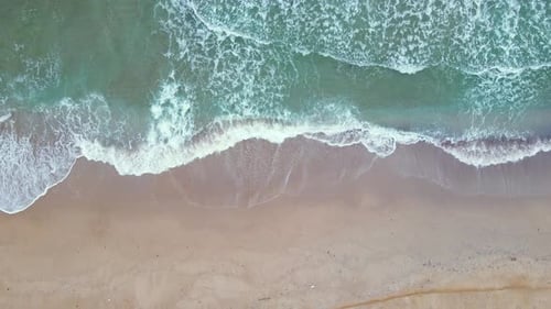 High and powerful waves coming fast to the beach, waves in winter day