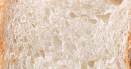 Poking Soft Slice of White Bread Texture