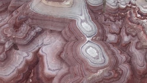 Aerial view of colorful texture in the eroded desert terrain