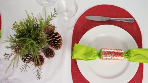 Festive Holiday Table Setting with Decorations