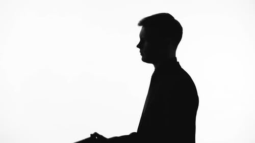 Male Silhouette Holding Gun, Preparing to Shoot, Revenge, Contract Killing