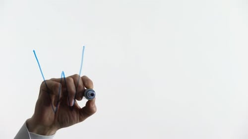 Hand Writes Wealth with Blue Marker