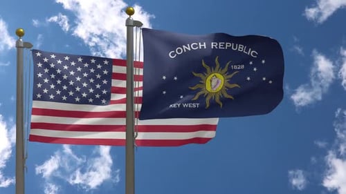 USA-Flagge gegen Key West City Flagge Florida auf Fahnenmast