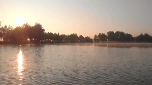 Sunrise on the Lake Reflection of Sun in Water