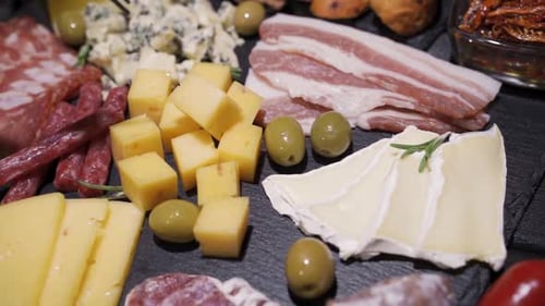 Restaurant Meat Platter (Ham, Salami, Bacon) on the Black Stone Tray