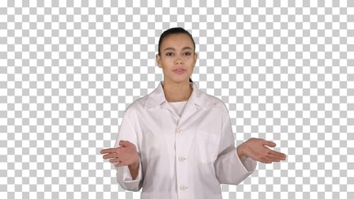 Woman in Lab Coat Explaining Medical Information