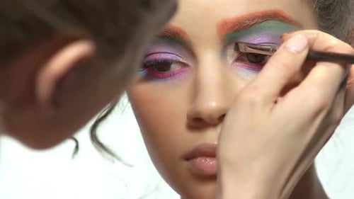 Visagist Is Applying Eyeshadow.