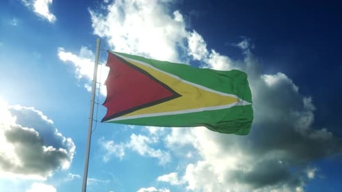Flag of Guyana Waving Against a Dynamic Blue Sky