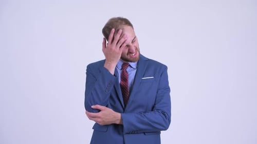 Man in Suit Gesturing Negatively
