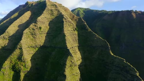 Aerial Shot of Tropical Mountain Having an Amazing Shape, Lit with Evening Sun