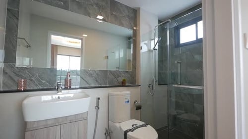 Bright Modern Bathroom Interior with White Fixtures