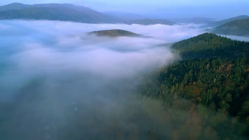 Aerial View of Mountains and Foggy Landscape