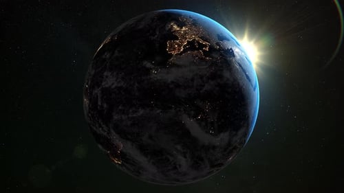 Space view of the sun rising on planet