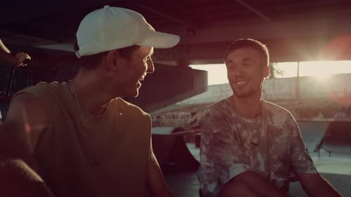 Positive Friends Having Fun Together at Skate Park