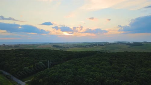 Tower with Electric Power Lines for Transfering High Voltage Electricity Located in Agricultural
