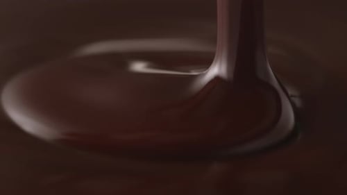 Dark Chocolate Being Poured in Close Up View