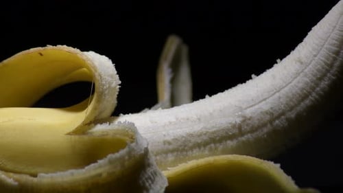 Close Up of Partially Peeled Banana