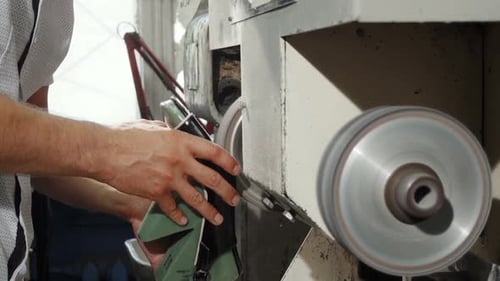 Craftsman Working on Leather Shoe with Machine