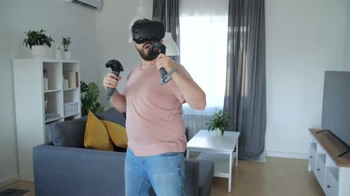 Man Boxing in Virtual Reality at Home