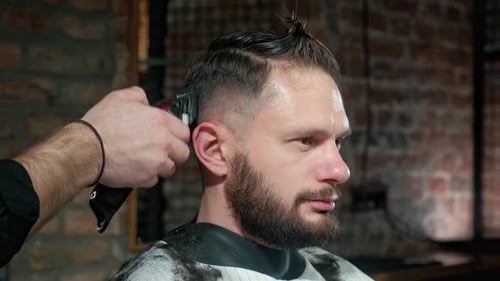 Male Haircut with Electric Razor. Close Up of Hair Trimmer Hairstyle. Professional Hairdresser