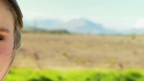 Portrait of beautiful woman standing in park 4k