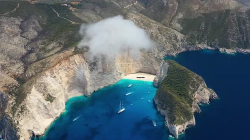 View of Navagio beach, Zakynthos Island, Greece. Aerial landscape. Blue sea water.